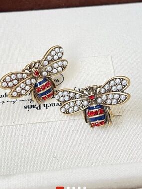 Gold Bee Earrings with Pearl Wings and Red & Blue Crystal Stripes